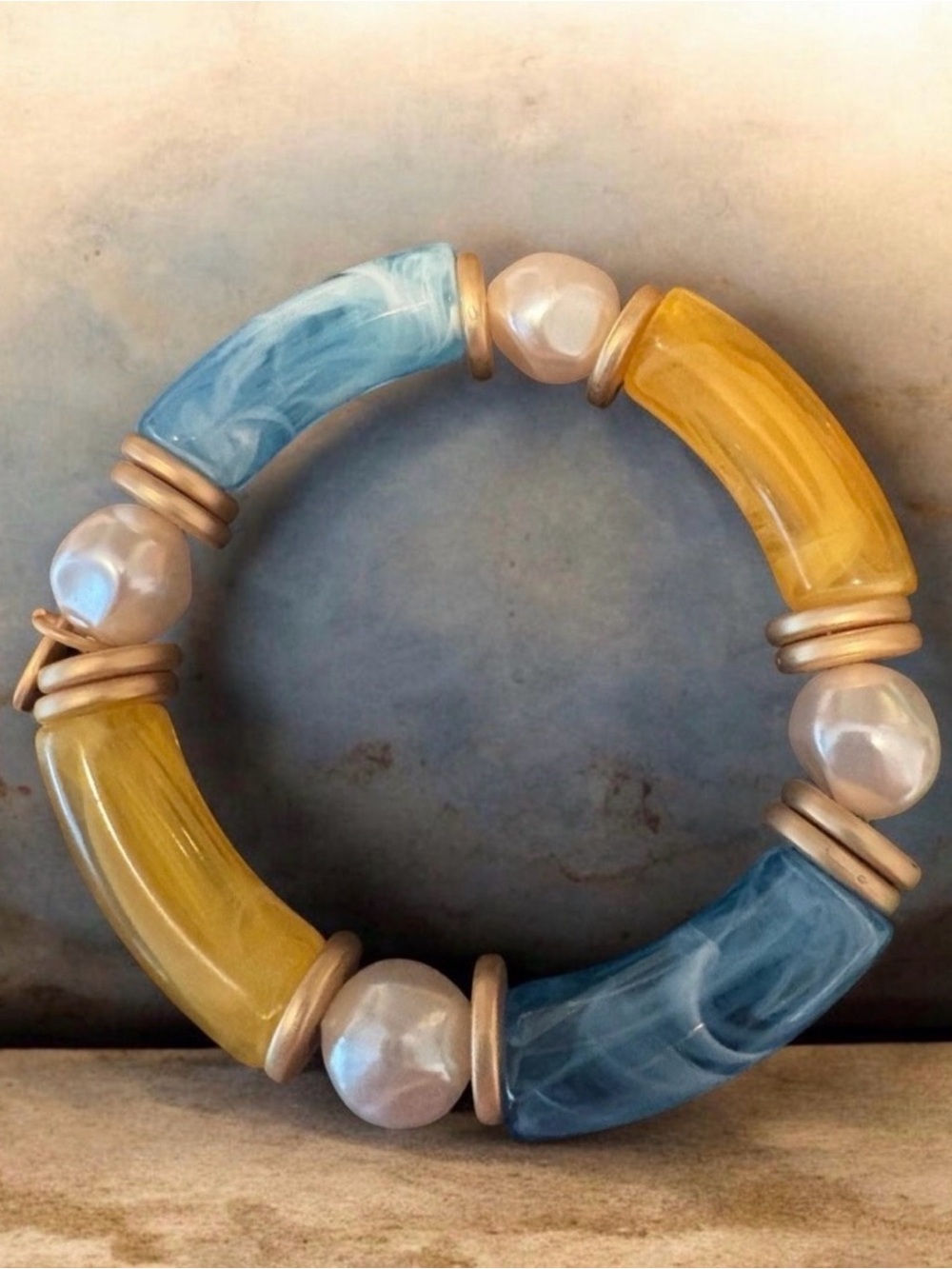 Plunder Blue and Yellow Curved Stretch Bead Bracelet with Pearl Accents
